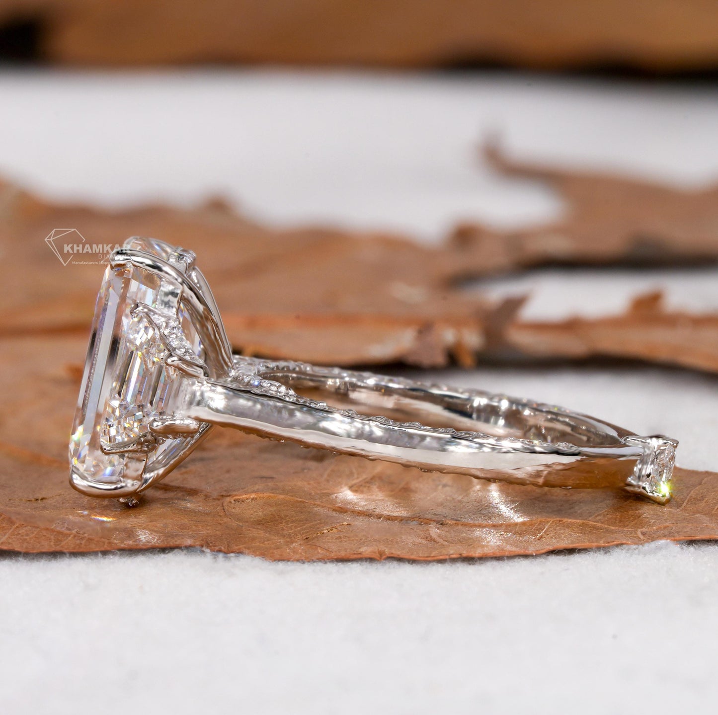 Emerald Cut Lab Diamond Three Stone Ring with Trapezoid Sides