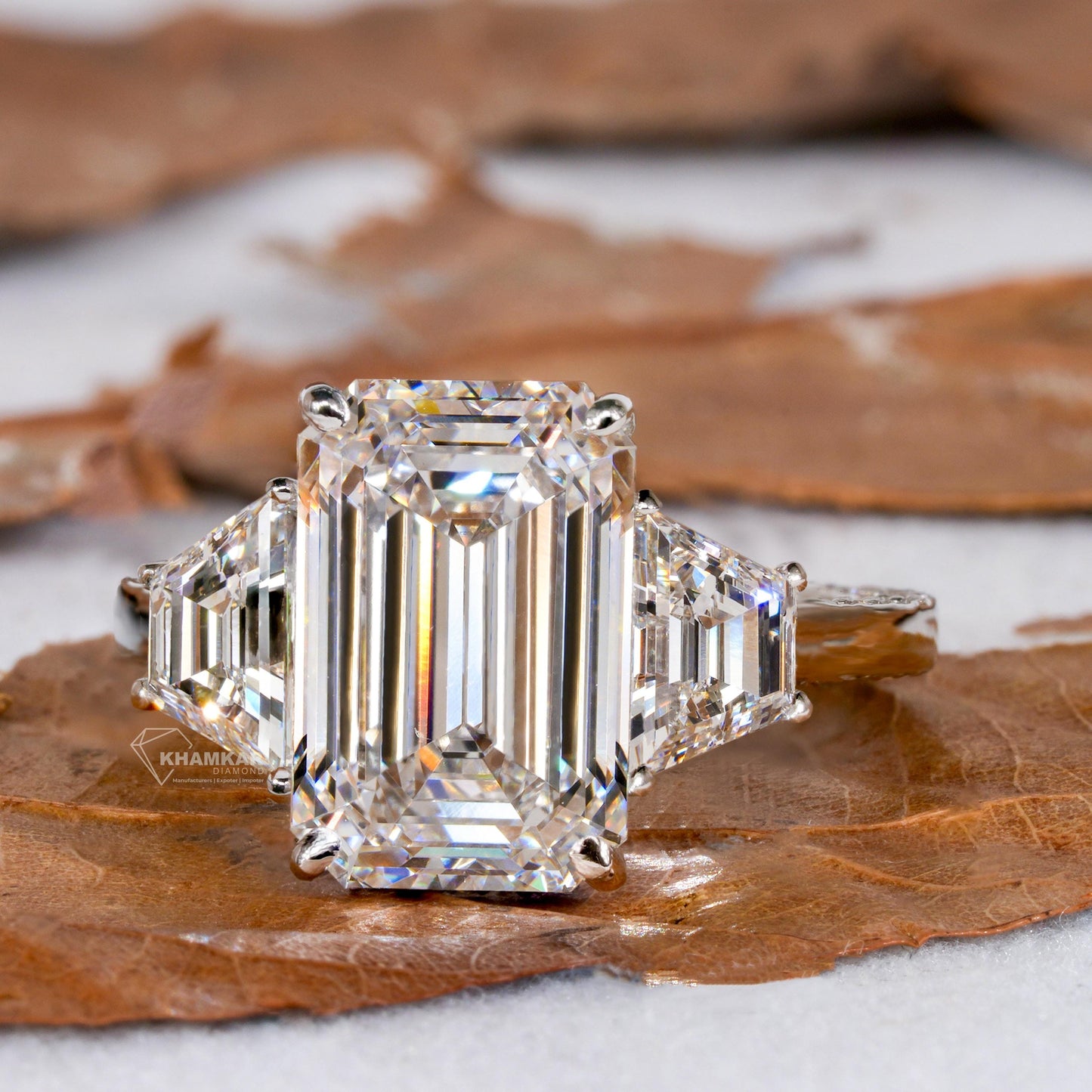 Emerald Cut Lab Diamond Three Stone Ring with Trapezoid Sides
