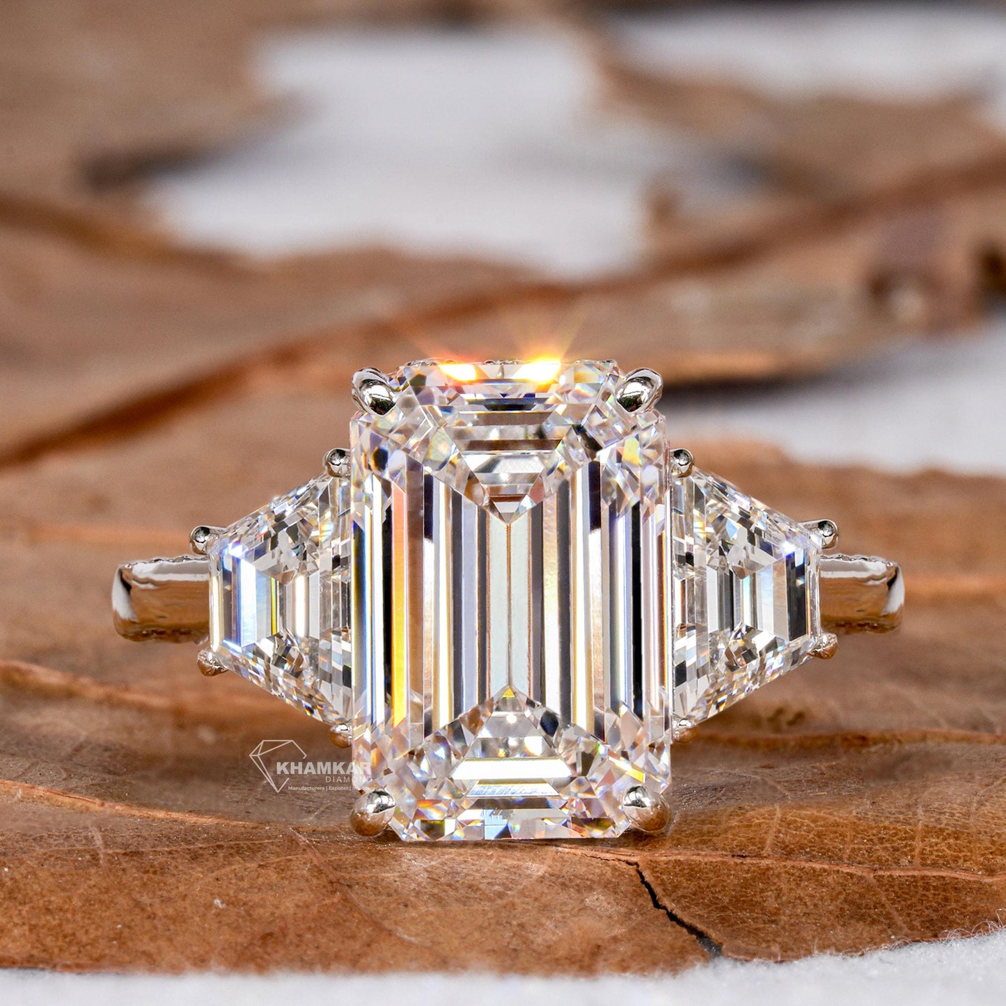 Emerald Cut Lab Diamond Three Stone Ring with Trapezoid Sides