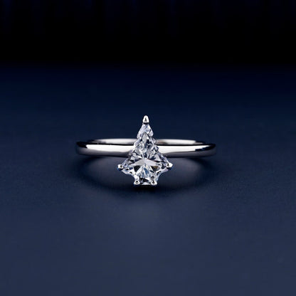 Solitaire ring with clear kite-shaped center stone in prong setting and polished white metal band, front view
