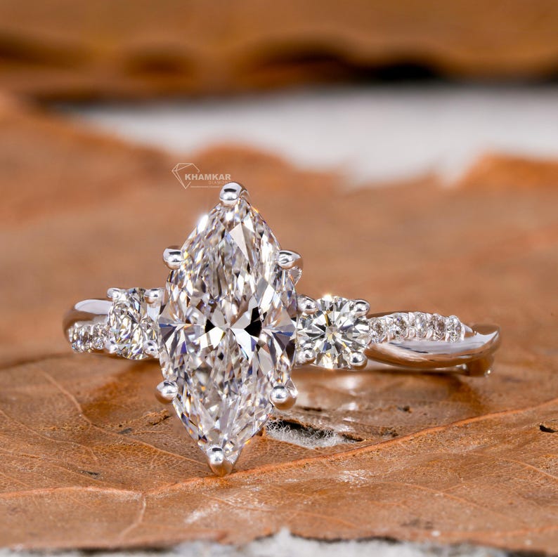 Marquise Lab Diamond Ring – 1–2 CT Twisted Three Stone Engagement ring