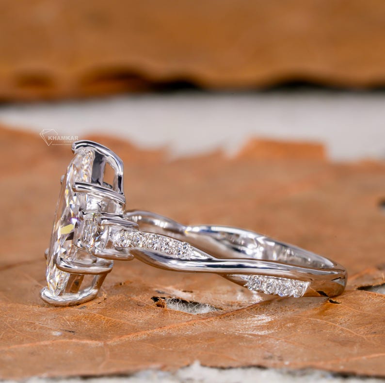 Marquise Lab Diamond Ring – 1–2 CT Twisted Three Stone Engagement ring