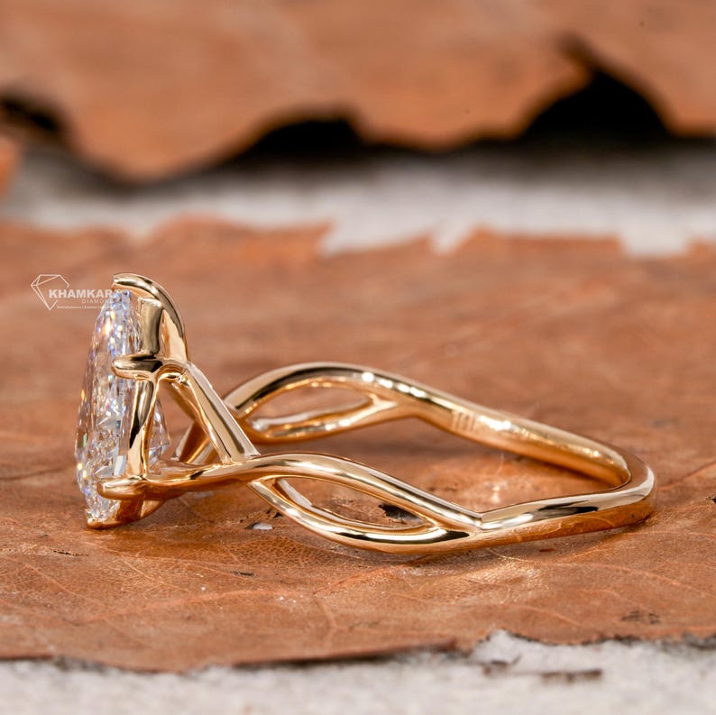 1.00CT Pear CutTwisted Lab Grown Engagement Rin
