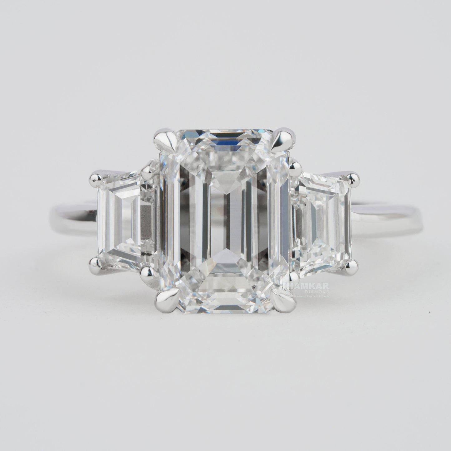 Emerald Lab Diamond Three Stone Ring with Trapezoid Sides