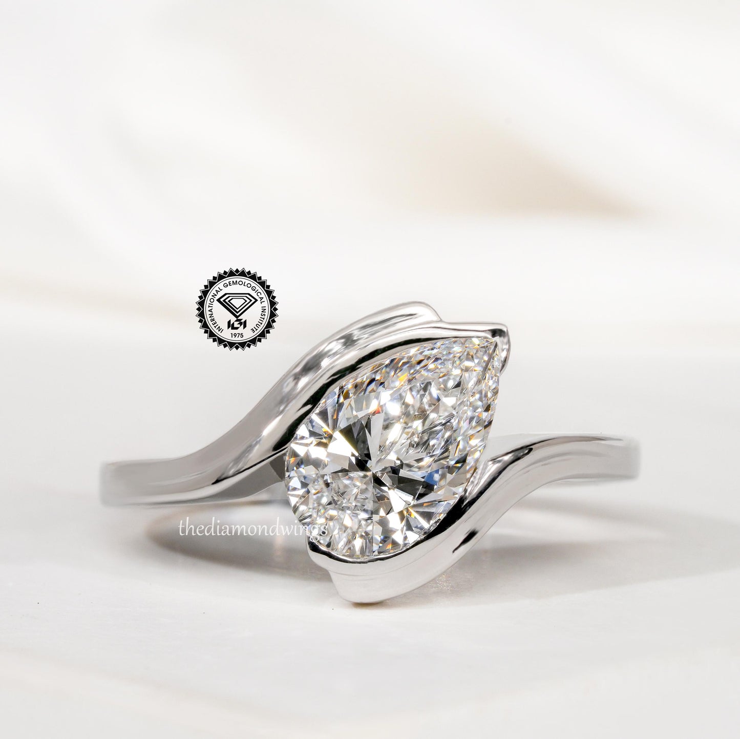 1.00CT Pear Cut Lab Grown Diamond Half Bezel Engagement Ring